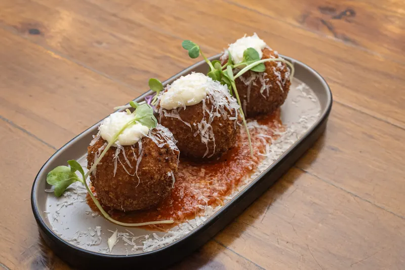 Arancini in napoli sauce with parmesan