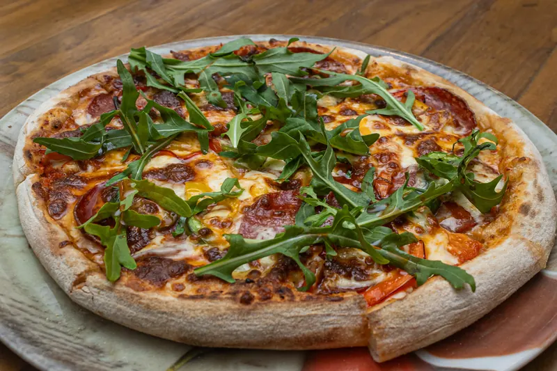 Diavola pizza with salami and rocket
