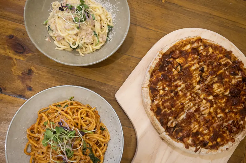 Pasta and pizza seen from above