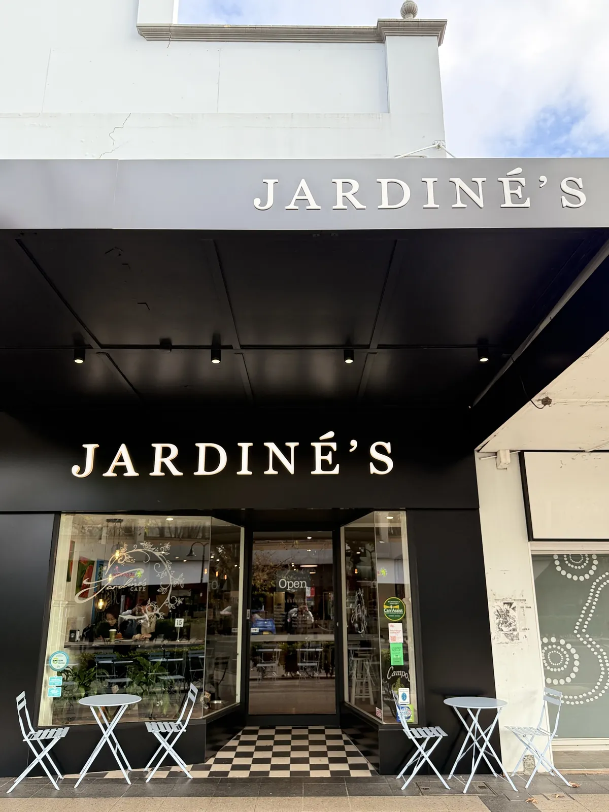 Jardine’s on Baylis Street, seen from the footpath under its black awning